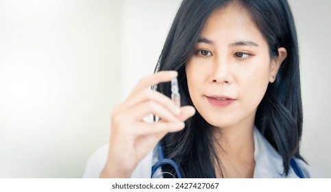 professional female doctor prepare medicine at hospital. - Powered by Shutterstock