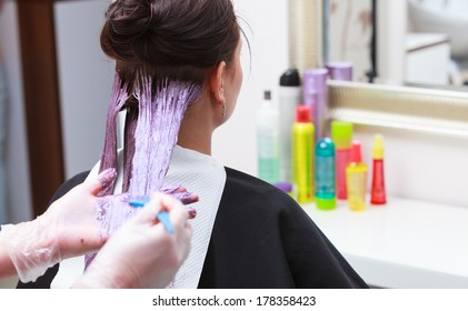 Professional Female Hairdresser Applying Color To Female Customer At Design Hair Salon, Woman Having Her Hair Dyed, Hair Dye Colouring In Process