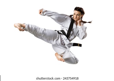 Professional female karate fighter isolated on the white background