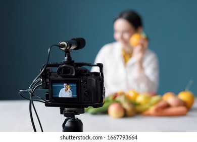 Professional Female Nutritionist Talking About Healthy Diet And Making A Video Blog 