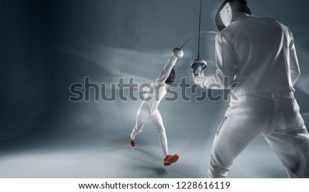 Professional fencer with rapier