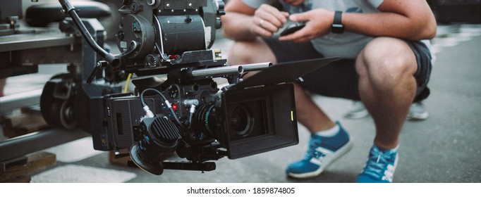 Professional Film And Video Camera On The Set. Shooting Shift, Equipment And Group. Modern Photography Technique.