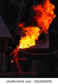 Professional Fire Breathers Is Breathing Fire Show On Stage At Night Safari In Singapore. It’s A Fantastic Performance.