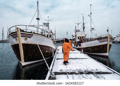 Professional Fishermen Are Preparating The Ships For Fishing In Norway