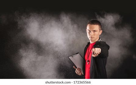 Professional Fitness Coach Isolated On Black Background