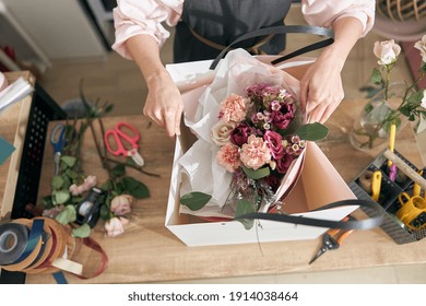 Professional Florist Young Woman Is Doing Bouquets At Flower Shop