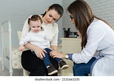 Professional General Medical Pediatrician Doctor In White Uniform Gown Listen Lung And Heart Sound Of Child Patient With Stethoscope: Physician Check Up Kid Female After Consult In Hospital