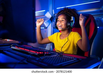 Professional girl gamer plays video games and winning the tournament. - Powered by Shutterstock