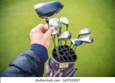 professional golf clubs in bag on green