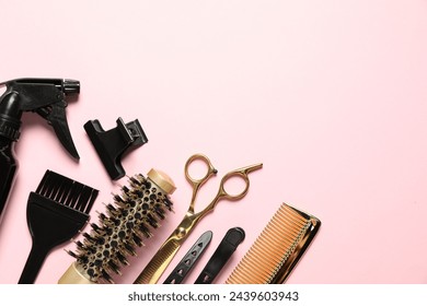 Professional hair dresser tools on pink background, flat lay. Space for text - Powered by Shutterstock