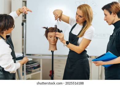 Professional Hairdresser Teaching Adult Students How to Use Hairdressing Scissors during Course in Education Center