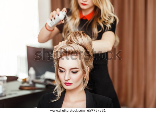 Professional Hairdresser Using Hair Spray On Stock Photo Edit Now