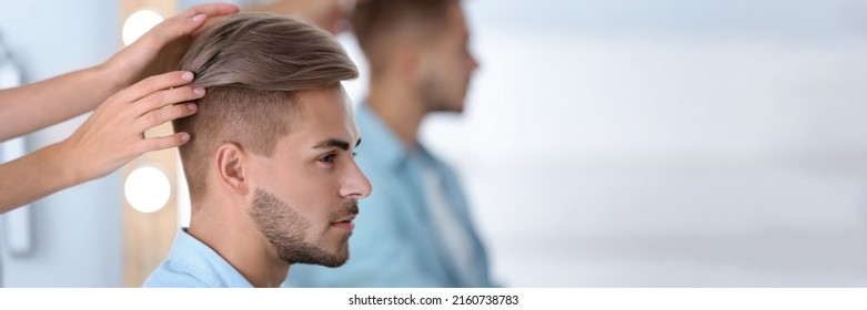 Professional Hairdresser Working With Young Man In Barbershop. Banner Design