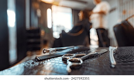 Professional hairdressing tools. Closeup of Various steel scissors and combs, hairbrushes on barbers workplace at barbershop salon. The concept hairdressing beauty. - Powered by Shutterstock