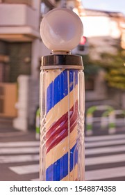 Professional Hairstylist Barber Retro Pole With A Red Color For Blood And A Blue Color For Veins In Japan.