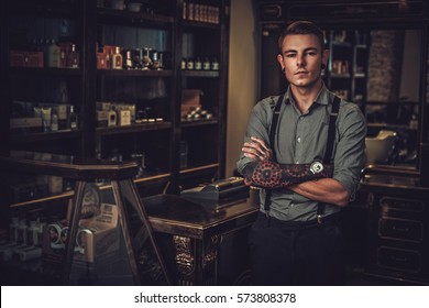 Professional Hairstylist In Barbershop Interior