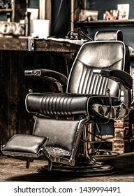 Professional Hairstylist In Barbershop Interior. Barber Shop Chair. Barbershop Armchair, Modern Hairdresser And Hair Salon. Beard, Bearded Man. Stylish Vintage Barber Chair. Black And White.