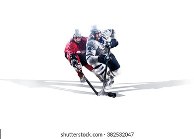 Professional hockey player skating on ice. Isolated in white