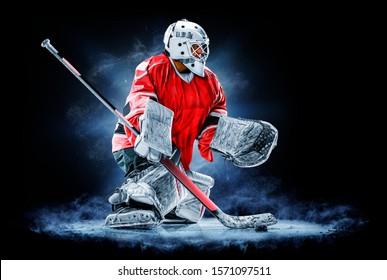 Professional Ice Hockey Goalkeeper Or Goalie Or Goaltender Isolated On Black Backgroung