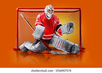 Professional Ice Hockey Goalkeeper Or Goalie Or Goaltender Isolated On Orange Backgroung