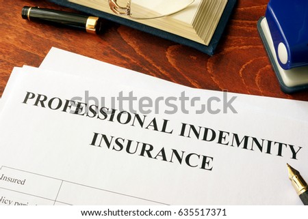 Professional indemnity insurance policy on a table.