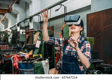 Professional Industrial Factory Woman With VR Technology Product Standing In Equipment Room And Hands Moving On Air Experience 3D Video At Milling Machine Work Room.