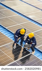 Professional inspecting solar panel installations on a rooftop ensuring renewable energy efficiency and sustainability practices highlighting clean energy technologies and environmental benefits.