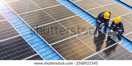Professional inspecting solar panel installations on a rooftop ensuring renewable energy efficiency and sustainability practices highlighting clean energy technologies and environmental benefits.