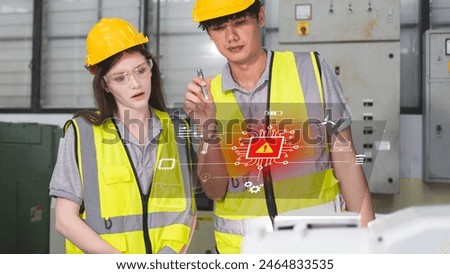 Professional and intelligence engineers used technical hard skill to fix, repair or maintenance an error system machine robotic arm in factory or industrial, examining or welding automobile workshop