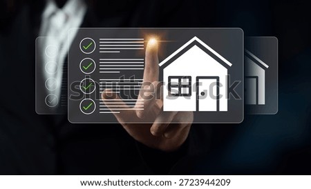 A professional interacts with a digital interface displaying checklist and house icons, emphasizing technology role in effective property management and real estate solutions. Gantry