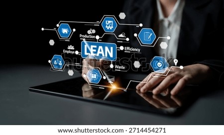 A professional interacts with a digital tablet showcasing lean management principles through holographic icons, emphasizing efficiency and waste reduction in business practices. Tessel