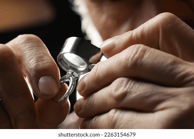 Professional jeweler working with ring, closeup view - Shutterstock ID 2263154679