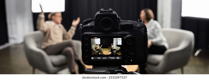 A professional journalist engages in a thoughtful discussion with a male expert, capturing key insights. - Powered by Shutterstock