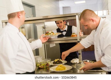 Professional Kitchen Cook Prepare Food Service Give Meals To Waiter