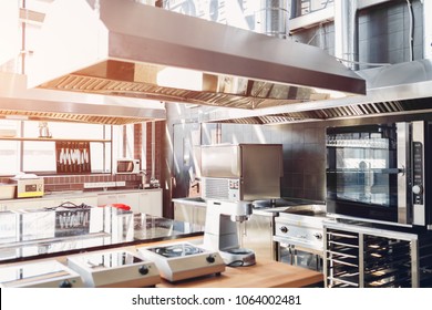 Professional Kitchen Of Restaurant. Modern Equipment And Devices. Empty Kitchen In The Morning.