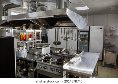 Professional Kitchen In Restaurant. Modern Equipment And Devices. Empty Kitchen
