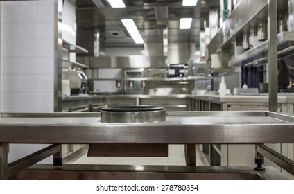 Professional Kitchen , View Counter In Stainless Steel . Bokeh .