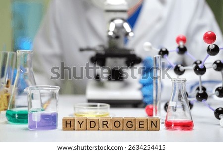 A professional lab setup featuring captivating hydrogen experiments and advanced microscopy techniques