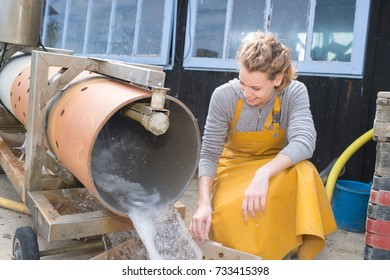 A Professional Lady Oyster Shucker