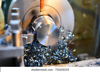 Professional machinist. Horizontal shot of a man operating lathe grinding machine metalworking industry concept copyspace - Powered by Shutterstock