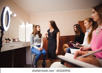 Professional Makeup Teacher Training Her Student Girls To Become Makeup Artists. Makeup Tutorial Lesson At Beauty School. Master Class. Real People. 