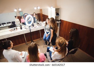 Professional Makeup Teacher Training Her Student Girl To Become Makeup Artist. Makeup Tutorial Lesson At Beauty School. Master Class. Real People. 