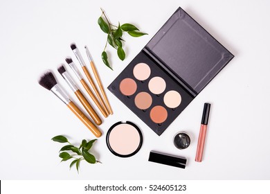 Professional makeup tools, flatlay on white background