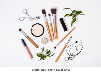 Professional makeup tools, flatlay on white background