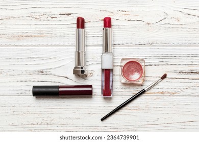 Professional makeup tools. Top view. Flat lay. Beauty, decorative cosmetics. Makeup brushes set and color eyeshadow palette on table background. Minimalistic style. - Shutterstock ID 2364739901