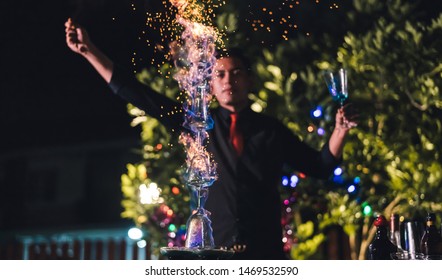 Professional Male Bartender Prepare Mixing Cocktail Drink At Village Night Party Celebration, Extra Work Job Service Customer Outdoor People Lifestyle.