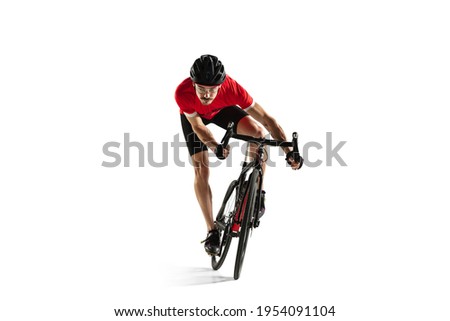 Professional male bike rider on road bike isolated over white background.