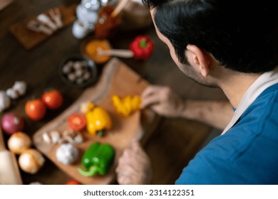 professional male chef prepare fresh ingredient for cook deliciuos healthy meal for breakfast and dinner with homemade cheese pizza flour and dough in kitchen