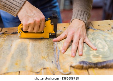 Professional Male Skinner, Furrier Working With Mink Fur Skin At Atelier, Workshop. Fashion And Leatherwork Concept