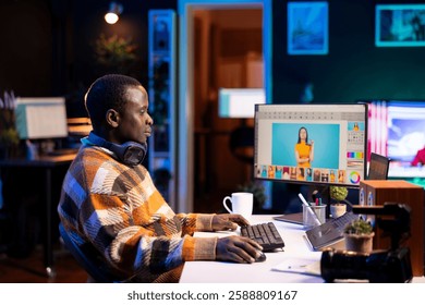 Professional man in creative setup at home using digital tools for graphic design and photo retouching, illustrating the modern tech driven design industry. Advanced tech industry.